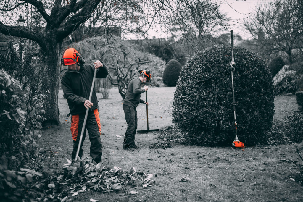 Men clearing up after completing work